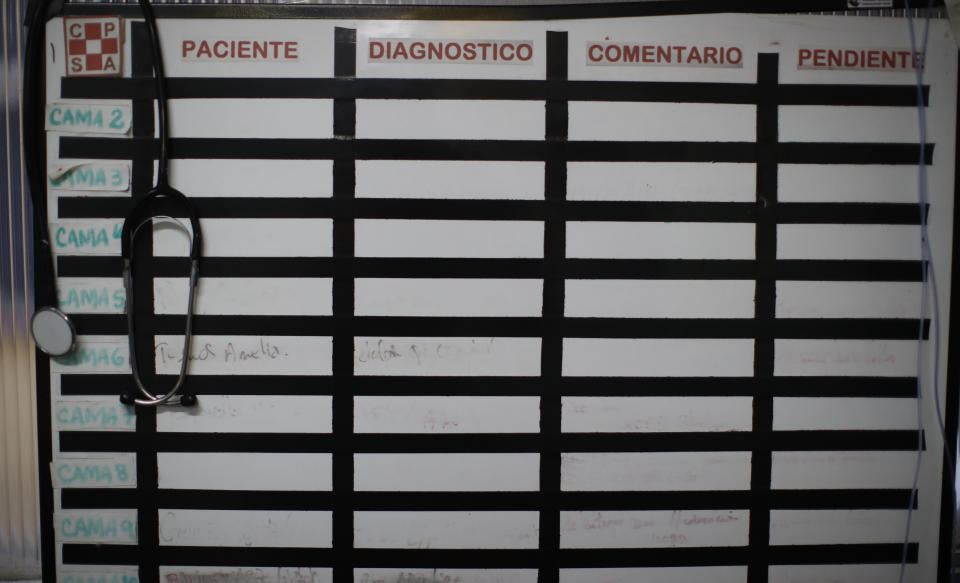 An empty white board hangs inside the ICU at the San Andres Clinic which has been occupied by its former workers since it closed at the start of the year following the death of the hospital's director and owner in Caseros, Argentina, Friday, April 30, 2021. While the pandemic has swelled the need for hospital beds, many private clinics say they're struggling to survive, citing the pandemic having pushed away many non-COVID patients and losing money on coronavirus sufferers because the government insurance program doesn't pay enough to meet costs. (AP Photo/Natacha Pisarenko)