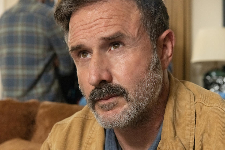 A still from Scream (2022) shows David Arquette as Dewey