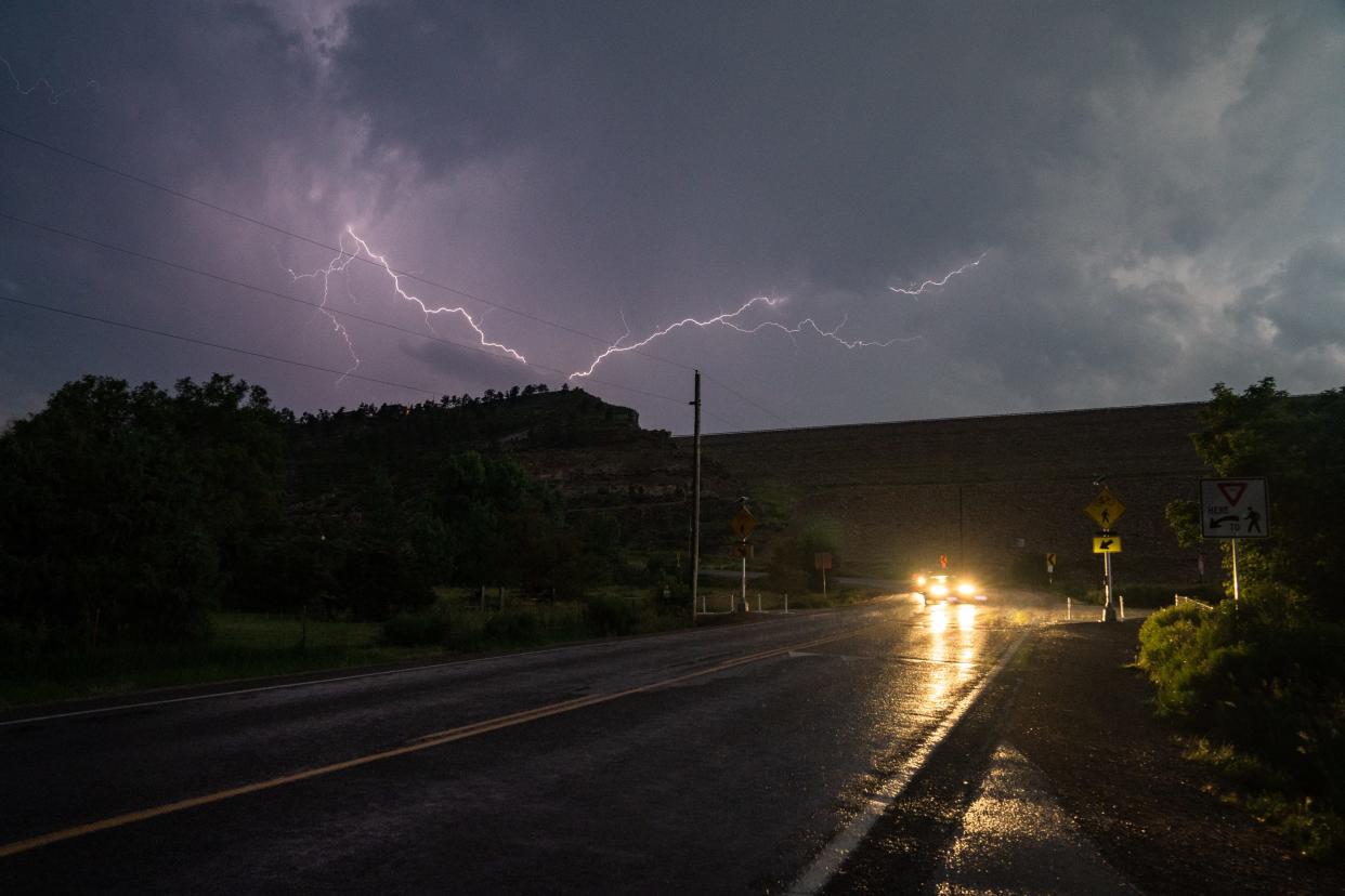 Lightning strikes over Horsetooth Reservoir in Fort Collins on Wednesday.