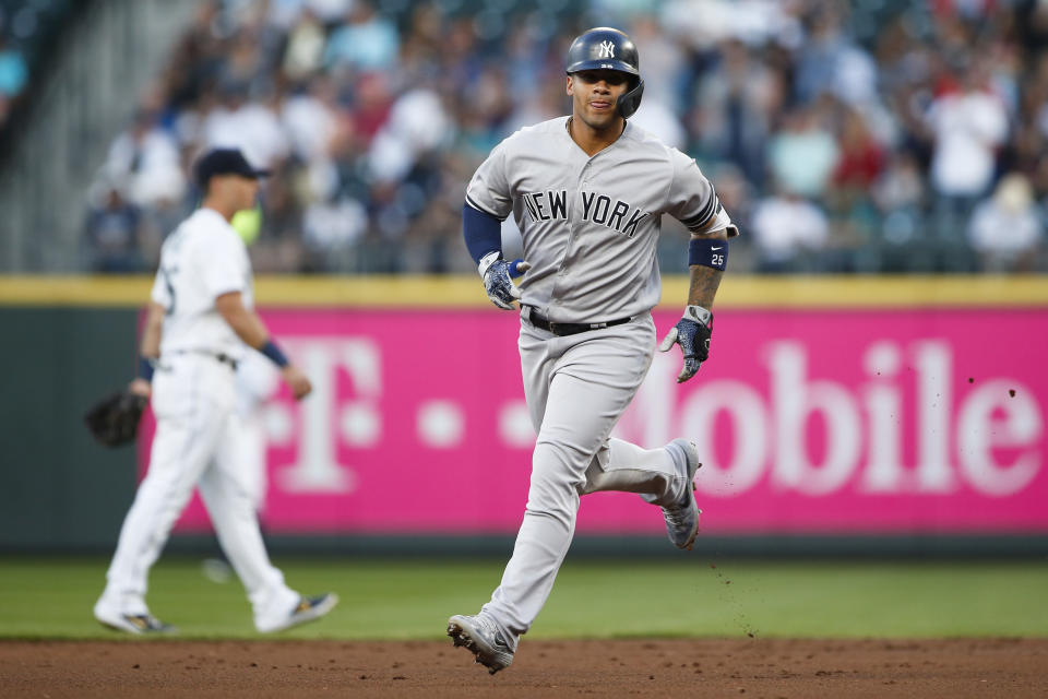 Aug 26, 2019; Seattle, WA, USA; New York Yankees shortstop Gleyber Torres (25) runs the bases after hitting a solo home run against the Seattle Mariners during the second inning at T-Mobile Park. Mandatory Credit: Joe Nicholson-USA TODAY Sports