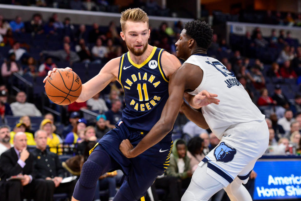 Indiana Pacers forward Domantas Sabonis (11) drives against Memphis Grizzlies forward Jaren Jackson Jr. (13) in the first half of an NBA basketball game Monday, Dec. 2, 2019, in Memphis, Tenn. (AP Photo/Brandon Dill)