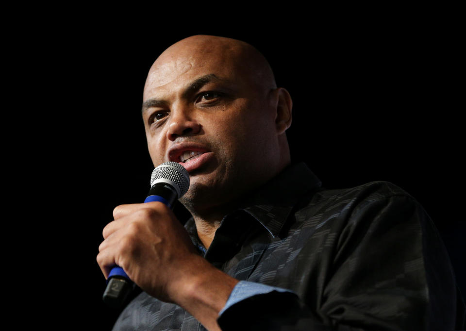 Former NBA basketball player Charles Barkley speaks to the crowd in support of Democratic Alabama U.S. Senate candidate Doug Jones, during a rally at Old Car Heaven in Birmingham, Alabama, U.S. December 11, 2017.  REUTERS/Marvin Gentry