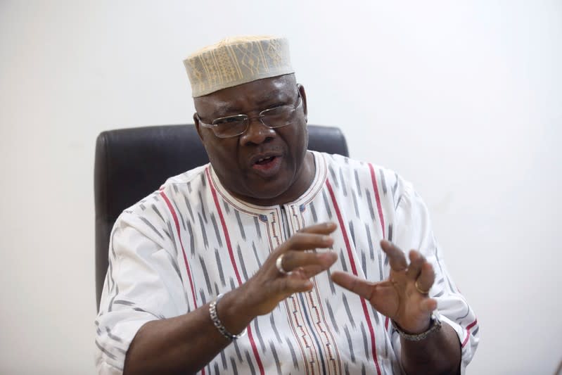 FILE PHOTO: Mines Minister Oumarou Idani speaks during an interview at his office in Ouagadougou