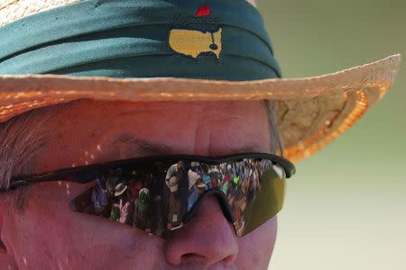 A Masters patron watches first round play during the 2018 Masters golf tournament at the Augusta National Golf Club in Augusta, Georgia, U.S. April 5, 2018. REUTERS/Brian Snyder