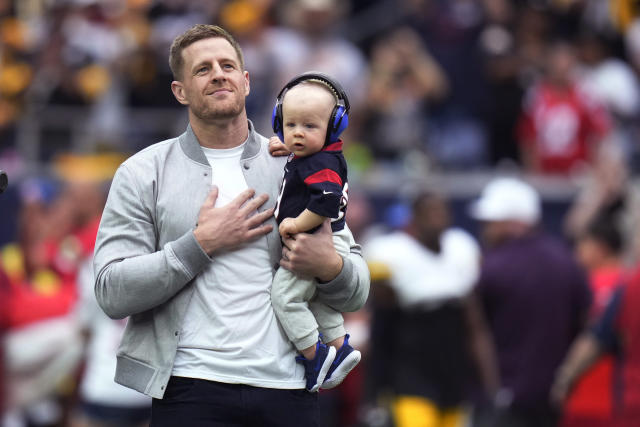 JJ Watt with Baby Son at Houston Texans Ring of Honor Induction