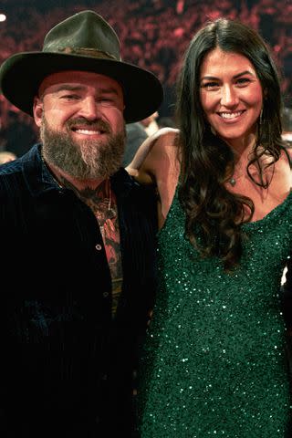 <p>John Shearer/Getty</p> Zac Brown, guest and Keith Urban attend the 56th Annual Country Music Association Awards at Bridgestone Arena on November 09, 2022 in Nashville, Tennessee