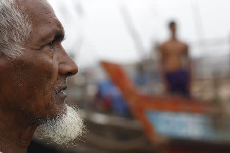 A Muslim Rohingya man is seen at a fishing port at a refugee camp outside Sittwe October 29, 2015. REUTERS/Soe Zeya Tun