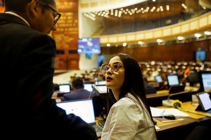 FILE PHOTO: National assembly members listen to the report that investigated an alleged corruption scheme in the government of Guillermo Lasso, in Quito