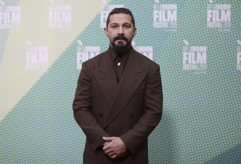 FILE - In this Oct. 3, 2019 file photo, Shia LaBeouf poses for photographers at the premiere of "The Peanut Butter Falcon" during the London Film Festival. LaBeouf turns 34 on June 11. (Photo by Vianney Le Caer/Invision/AP, File)