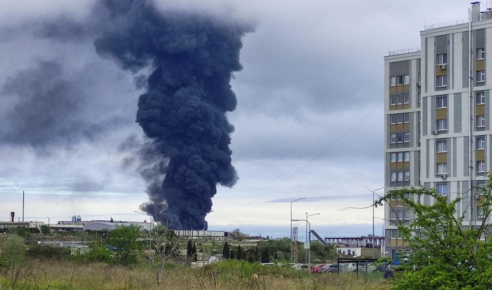Smoke fire oil fuel tank drone attack Sevastopol Crimea