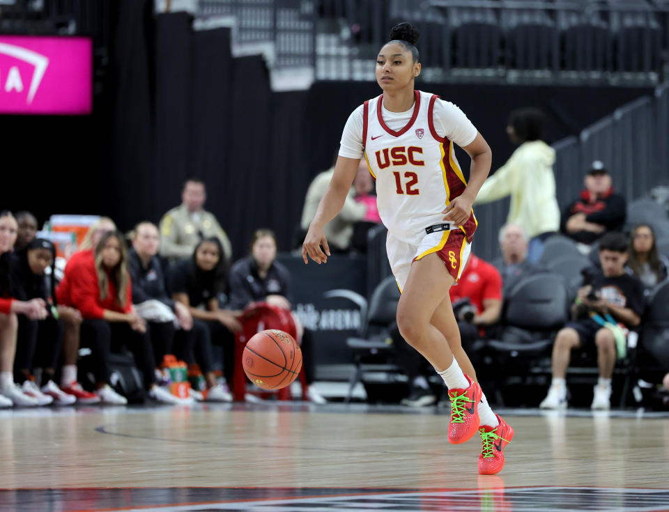 LAS VEGAS, NEVADA – NOVEMBER 06: JuJu Watkins #12 of the USC Trojans brings the ball up the court against the Ohio State Buckeyes in the second half of their game during the Naismith Basketball Hall of Fame Series at T-Mobile Arena on November 06, 2023 in Las Vegas, Nevada. The Trojans defeated the Buckeyes 83-74. (Photo by Ethan Miller/Getty Images)