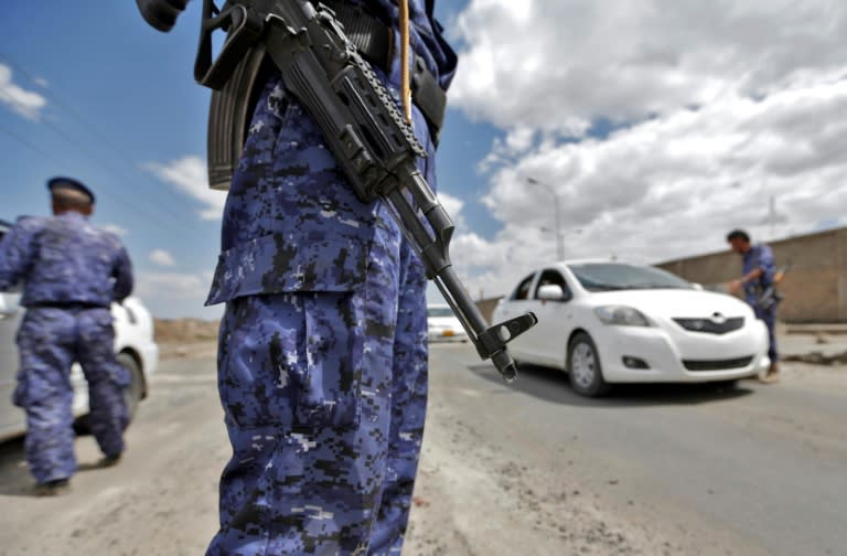 A Yemeni soldier loyal to the Iran-backed Huthi rebels mans a checkpoint in the Yemeni capital on September 19, 2017