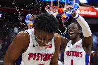 Nov 27, 2018; Detroit, MI, USA; Detroit Pistons forward Stanley Johnson (7) is sprayed with water by guard Reggie Jackson (1) after the game against the New York Knicks at Little Caesars Arena. Mandatory Credit: Rick Osentoski-USA TODAY Sports