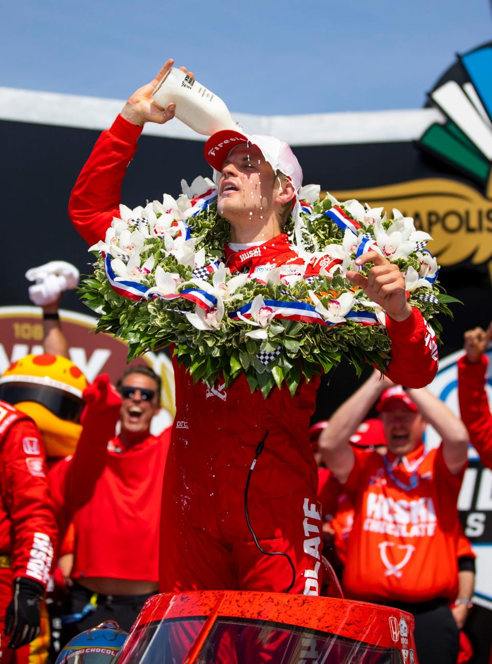 Marcus Ericsson celebrates with the milk after winning the 2022 Indianapolis 500 at Indianapolis Motor Speedway.