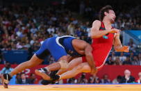 LONDON, ENGLAND - AUGUST 12: Sushil Kumar of India in action against Akzhurek Tanatarov of Kazakhstan during the Men's Freestyle Wrestling 66kg semi final match on Day 16 of the London 2012 Olympic Games at ExCeL on August 12, 2012 in London, England. (Photo by Ryan Pierse/Getty Images)