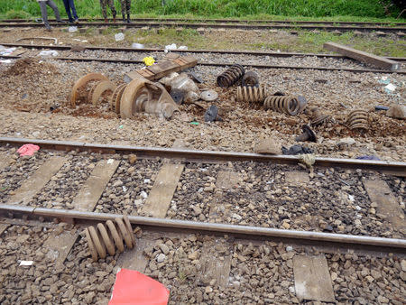 Debris from a derailed Camrail train is seen in Eseka, Cameroon, October 22, 2016. Picture taken October 22, 2016. REUTERS/Anne Mireille Nzouankeu