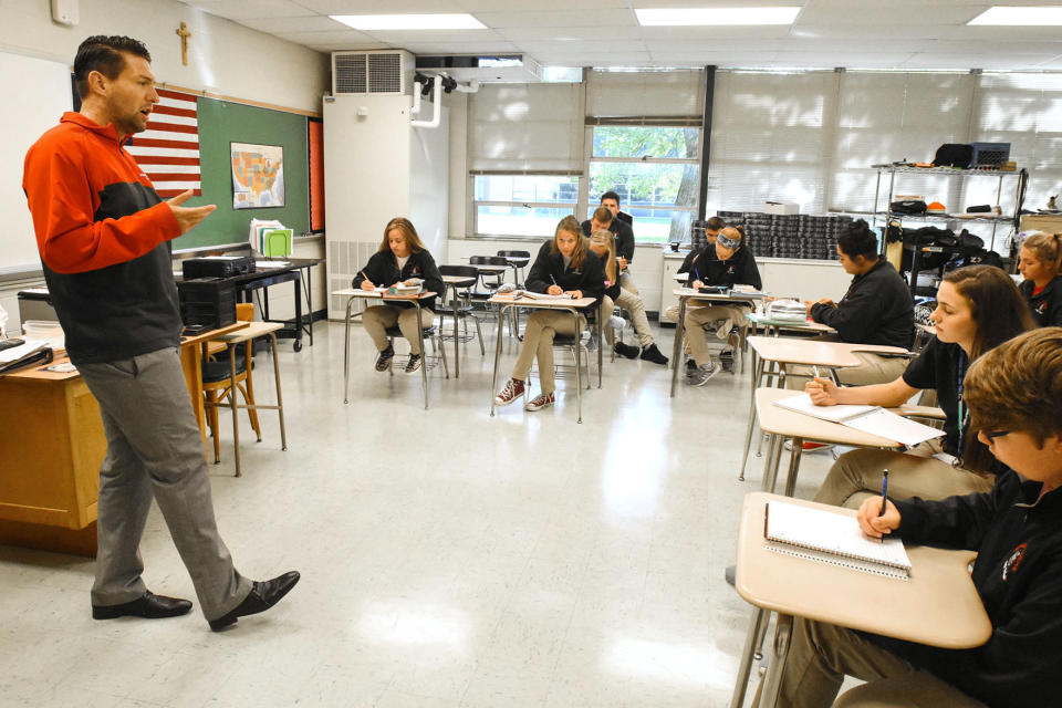 Jordan Miller teaches a junior English class at Bishop Luers High School in Fort Wayne.