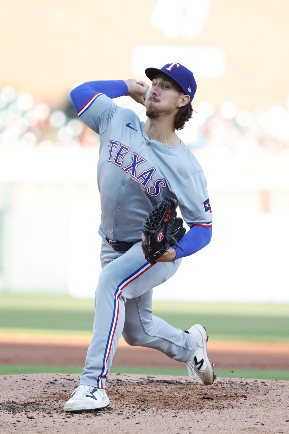 Texas Rangers starting pitcher Michael Lorenzen pitches against the Detroit Tigers at Comerica Park, Monday, April 15, 2024.