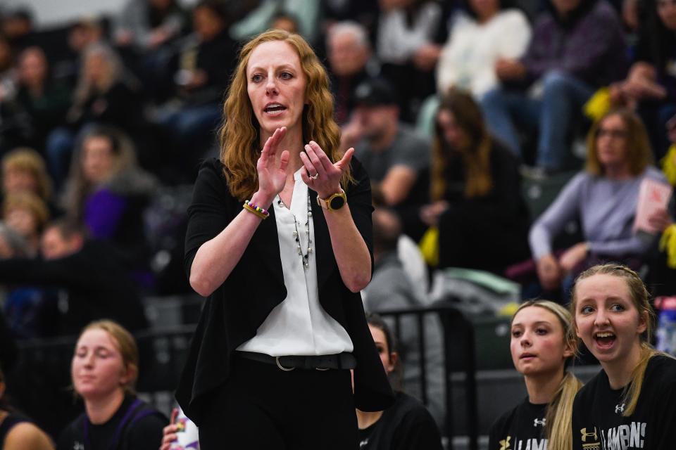 Fort Collins head coach Kerstin Young cheers for the team in a girls high school basketball game against Fossil Ridge at Fossil Ridge High School on Jan. 31, 2023.