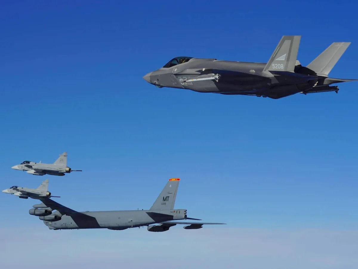 US B-52s and fighters from what may soon be NATO's newest member teamed up for a..