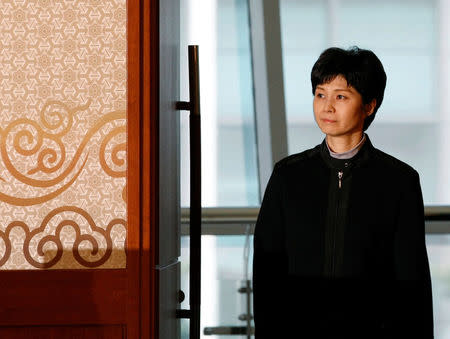 FILE PHOTO : Former North Korean spy Kim Hyun Hee arrives at a meeting with Shigeo Iizuka and Koichiro Iizuka (not pictured), family members of Yaeko Taguchi who was abducted by North Korea decades ago, before a news conference in Busan, South Korea, March 11, 2009. REUTERS/Kim Kyung-Hoon/File Photo