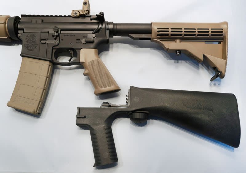 A bump fire stock that attaches to a semi-automatic rifle to increase the firing rate is seen at Good Guys Gun Shop in Orem