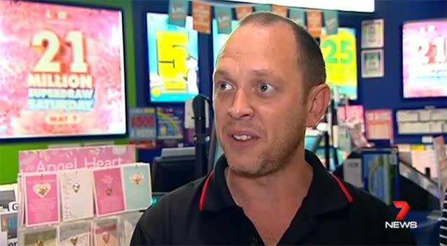 Sandro Borsato works at the Campbelltown newsagent that sold the winning ticket. Photo: 7 News