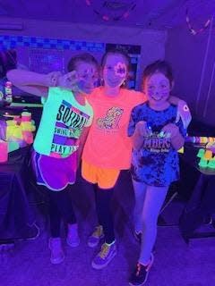Sebring B.L. Miller Elementary students sport neon during the school's recent Glow Night.