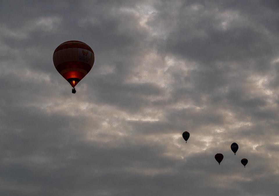 Hot air balloons floated up and away at Bowman Field during the KDF Great Balloon Race on Saturday morning. April 29, 2023