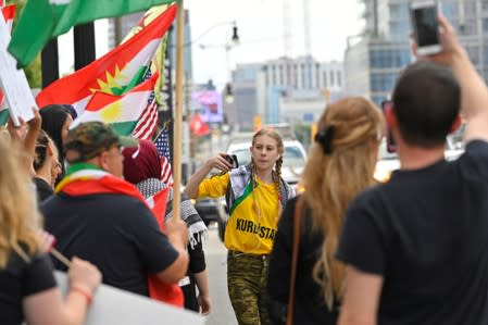 A crowd of over 500 people protest in support of Kurds after the Trump administration changed its policy in Syria