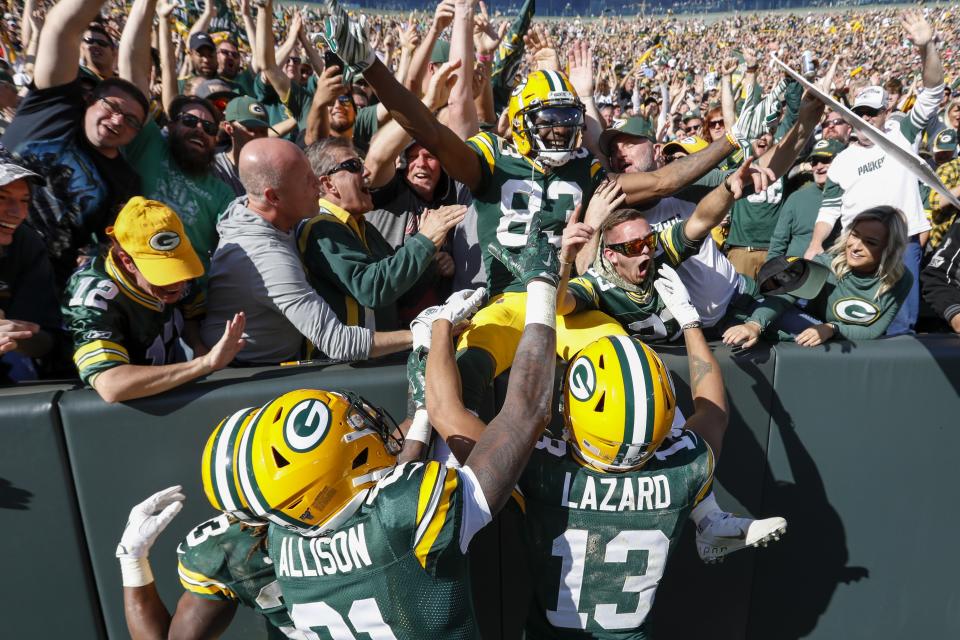 Green Bay Packers' Marquez Valdes-Scantling celebrates his touchdown catch during the second half of an NFL football game against the Oakland Raiders Sunday, Oct. 20, 2019, in Green Bay, Wis. (AP Photo/Mike Roemer)