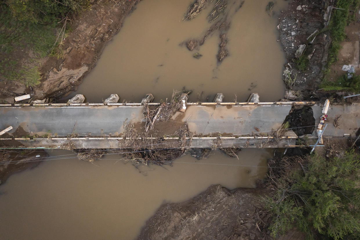 View of a damaged bridge after Hurricane Fiona hit Villa Esperanza in Salinas, Puerto Rico, Wednesday, September 21, 2022. (AP Photo/Alejandro Granadillo)