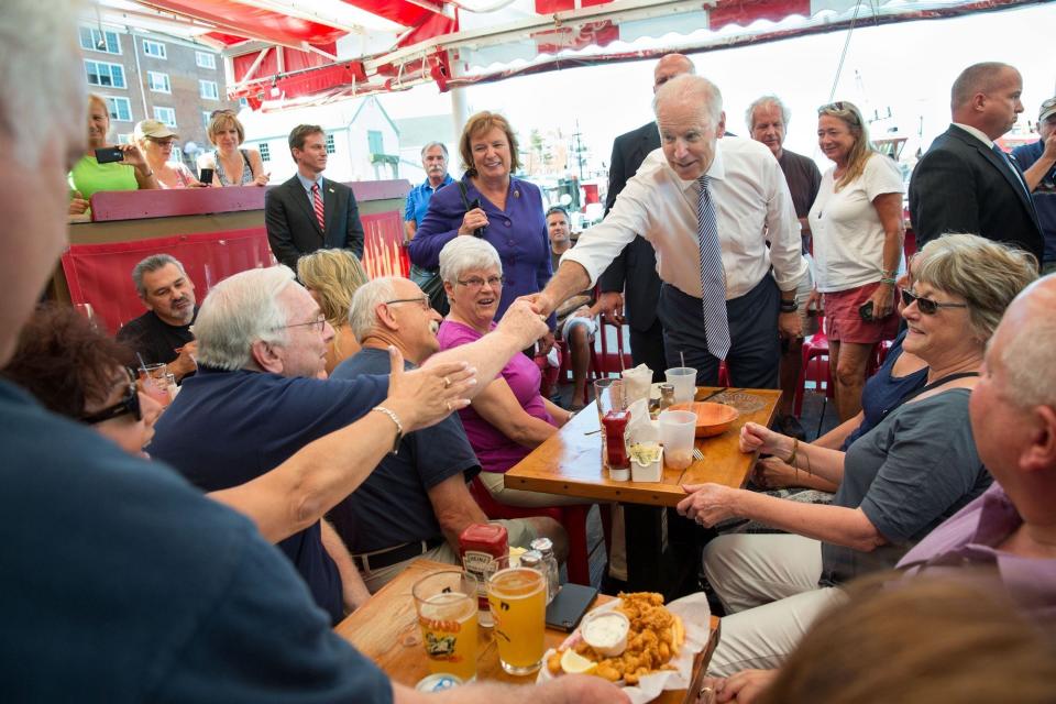 Vice President Joe Biden and Congresswoman Carol Shea-Porter shake hands before eating lunch at the Old Ferry Landing in Portsmouth, New Hampshire. Sept. 3,&nbsp;2014.