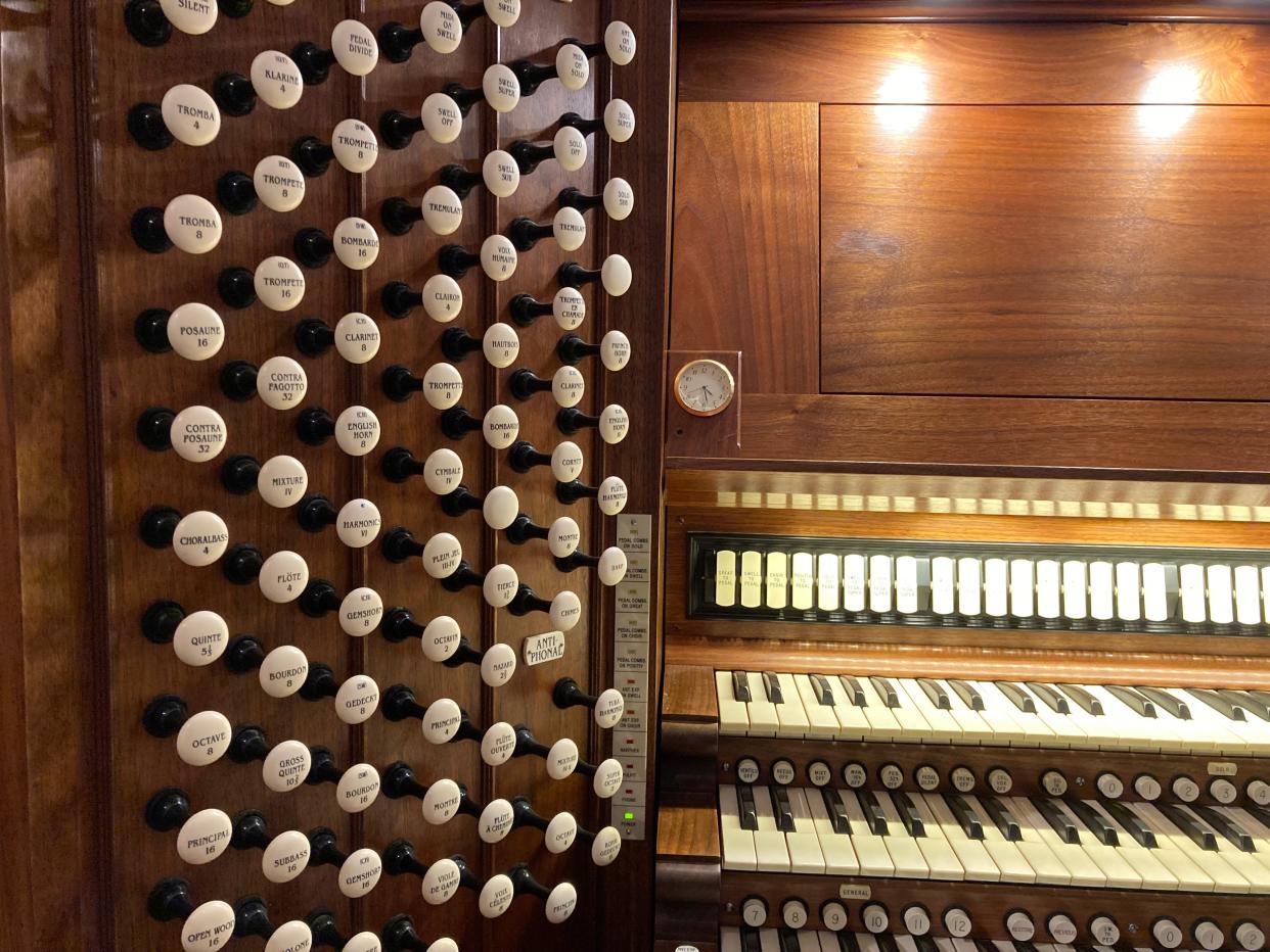 The keyboard and the "stops" or knobs used by keyboardist and organ player, Wesley Hall, minister of music at the First Baptist Church Worcester, uses to play one of two pipe organ in the church; he explains how they work in his Tik Tok videos, some of which have gone viral