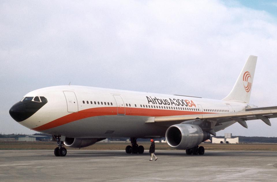 An Airbus A300 in 1972 has a white livery with orange accent.