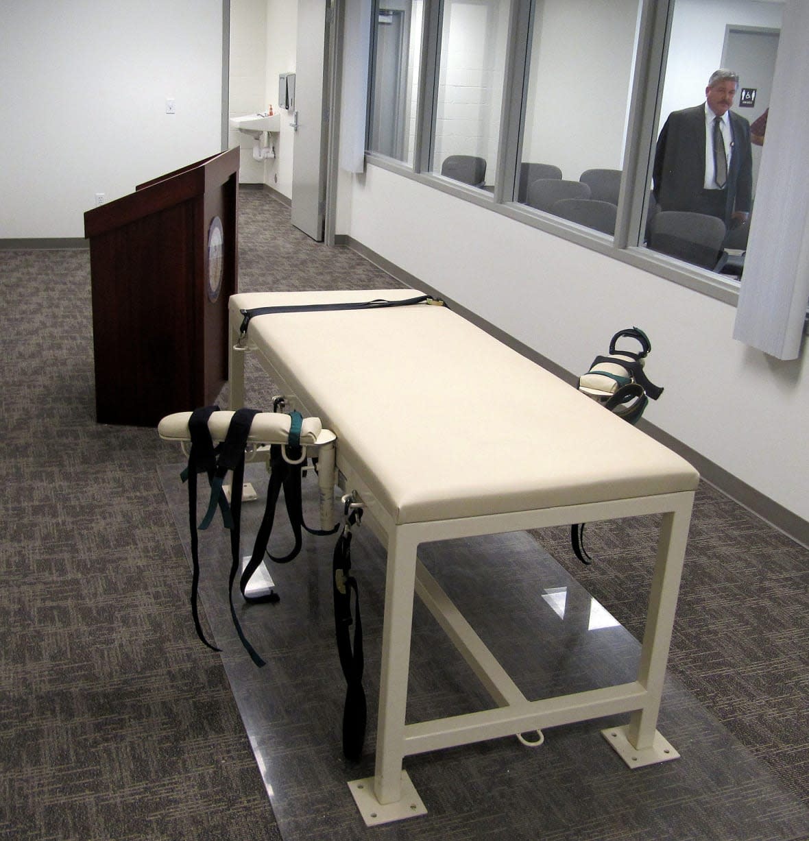 Security Institution Warden Randy Blades stands on the other side of the execution chamber on Oct. 20, 2011 at the Idaho Maximum Security Institution in Boise, Idaho. (AP Photo/Jessie L. Bonner, File)