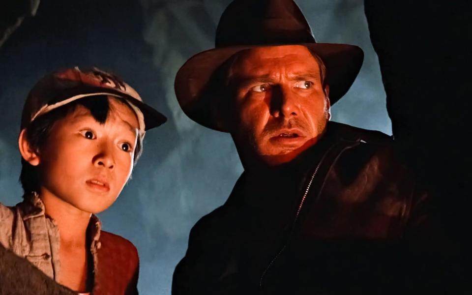 Ke Huy Quan with Harrison Ford in Indiana Jones and the Temple of Doom, 1984 - Alamy