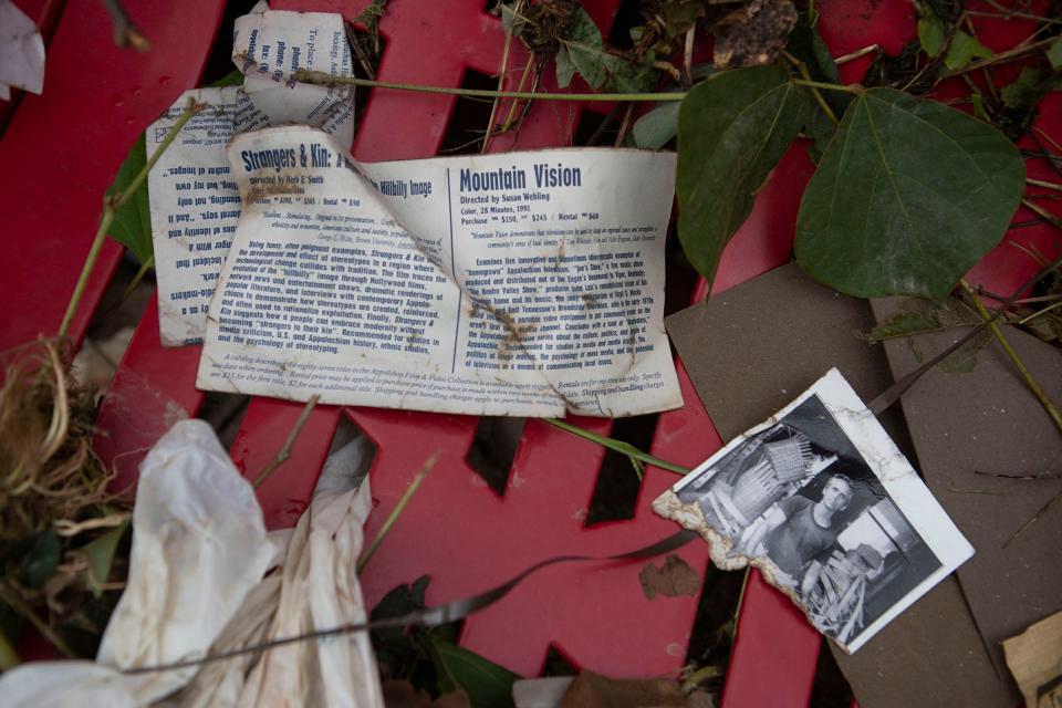 Memorabilia from Appalshop, a media, arts and entertainment center in Whitesburg, Kentucky, are embeded in a park bench following in the region. July 29, 2022