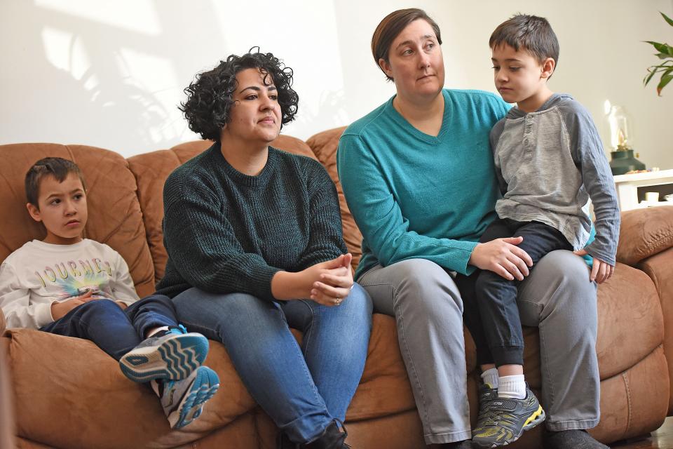 Max, left, with parents Linda Nunes-Quimby, Michelle Quimby and brother Titus, 6.