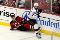 NEWARK, NJ - JUNE 09: Jarret Stoll #28 of the Los Angeles Kings collides with Anton Volchenkov #28 of the New Jersey Devils during Game Five of the 2012 NHL Stanley Cup Final at the Prudential Center on June 9, 2012 in Newark, New Jersey. (Photo by Jim McIsaac/Getty Images)