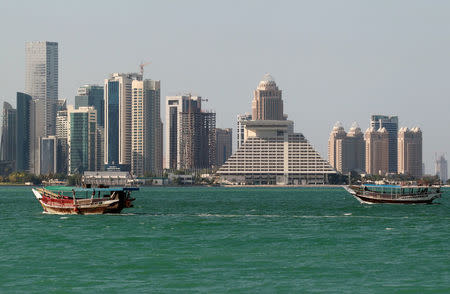 FILE PHOTO: Buildings are seen on a coast line in Doha, Qatar June 5, 2017. REUTERS/Naseem Zeitoon/File Photo