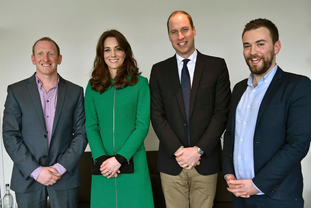 Inspiring story: Jonny Benjamin, far right, the founder of mental health charity Beyond, with the Duke and Duchess of Cambridge and, right, Neil Laybourn, who talked Mr Benjamin out of taking his own life in 2008 (AFP via Getty Images)