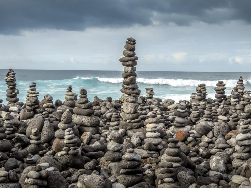 The rock towers around the eastern end of Playa Jardin in Puerto De La Cruz in the north of the island Photo was taken November 2018 on a walk along the coastal path.