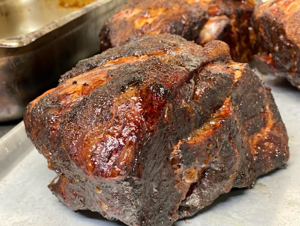 Haywood Smokehouse offers barbecue platters, sandwiches, small bites and more.