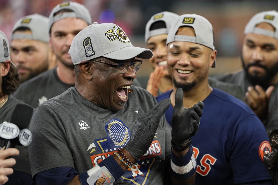 FILE - Houston Astros manager Dusty Baker Jr., and the Houston Astros celebrate their 4-1 World Series win against the Philadelphia Phillies in Game 6, in Houston, Nov. 5, 2022. (AP Photo/David J. Phillip, File)