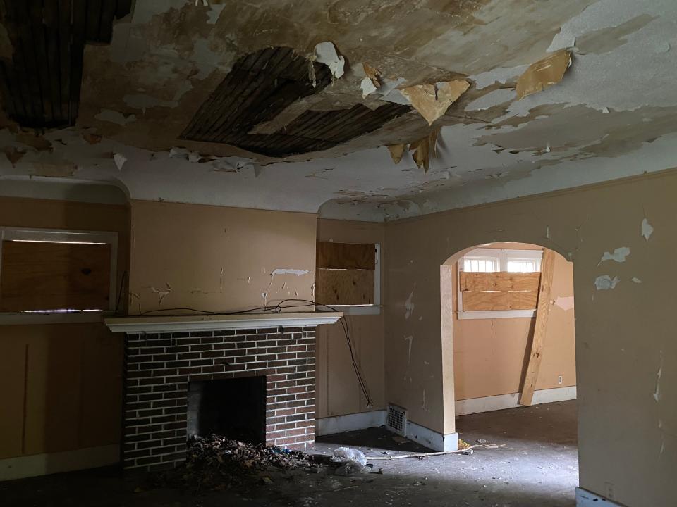 detroit land bank authority living room with fireplace