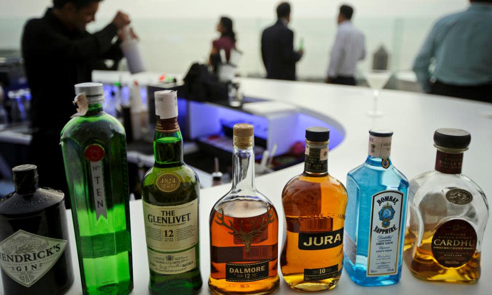 Bottles of scotch whisky among the drinks on offer at a bar in Mumbai, India