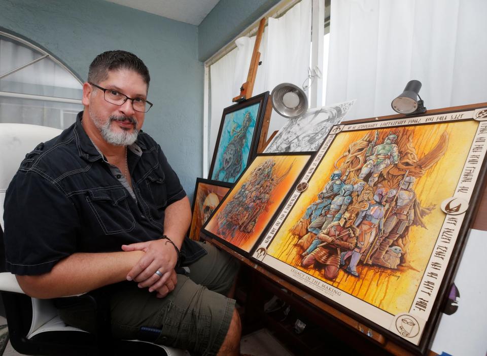 DeLeon Springs-based artist L. Jason Queen displays his painting, "Legacy in the Making," which was selected for this year's Star Wars Celebration convention.