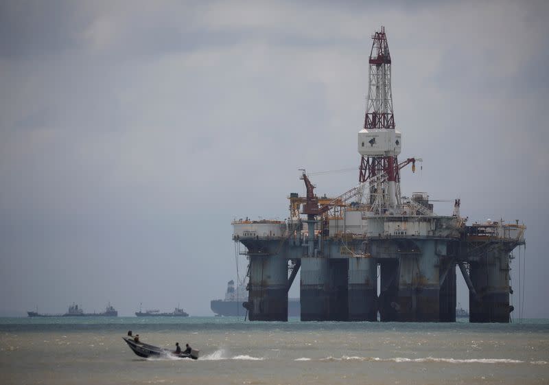 FILE PHOTO: An oil rig is seen in the waters on the southern coast of Pengerang