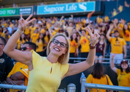 Nov 3, 2018; Tempe, AZ, USA; U.S. Representative from Arizona's 9th congressional district Kyrsten Sinema poses for a photo in front of the Arizona State Sun Devils student section prior to the game against the Utah Utes at Sun Devil Stadium. Mark J. Rebilas-USA TODAY Sports/File Photo